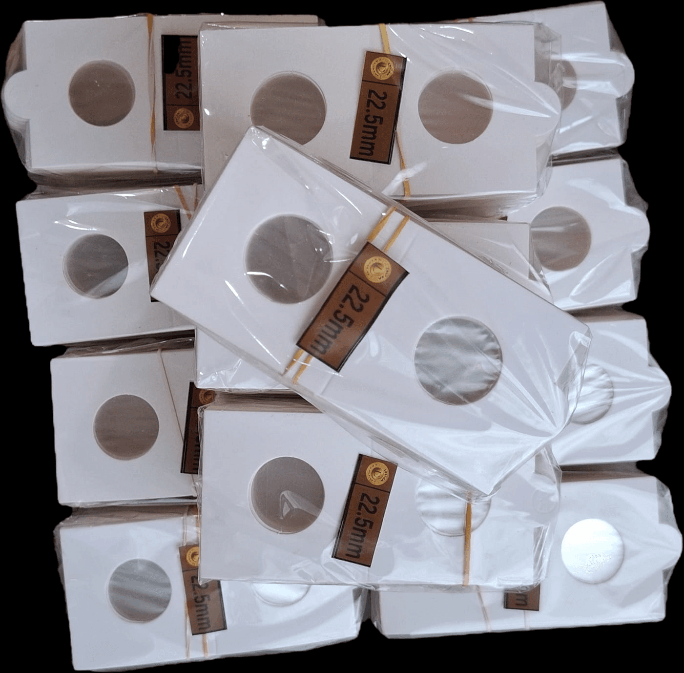 DOTCOM™ cardboard coin holders in protective packaging